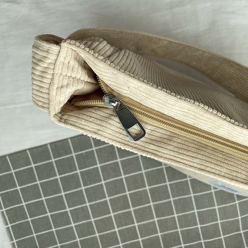 Skulderveske i kanvas - Avslappet og elegant stil