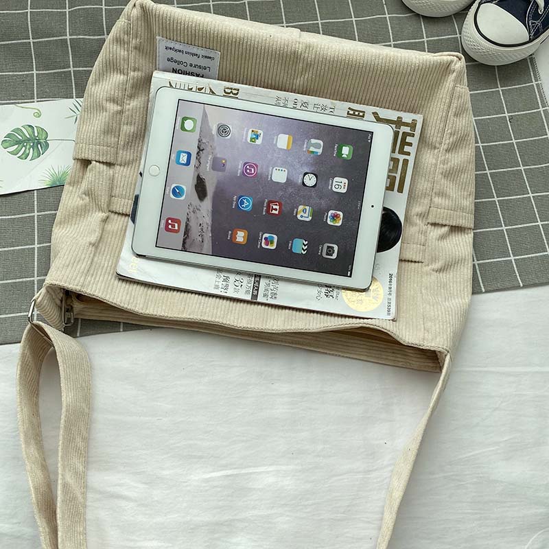 Skulderveske i kanvas - Avslappet og elegant stil