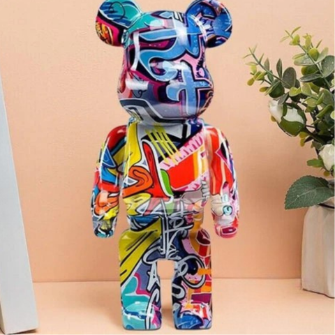 Koristeellinen graffitiveistos - kirkkaat värit ja kaupunkihenki